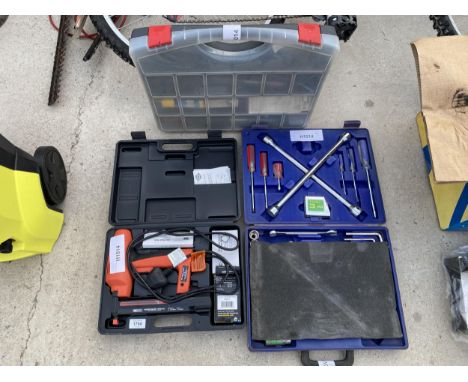 AN ASSORTMENT OF TOOLS TO INCLUDE A NAIL GUN, TOOL SET AND A HARDWARE CARRY CASE ETC 