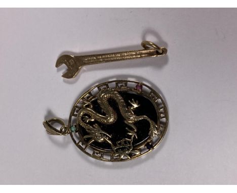 A 9CT YELLOW GOLD SPANNER PENDANT, WEIGHT 2.43G TOGETHER WITH YELLOW METAL ORIENTAL PENDANT (2) 