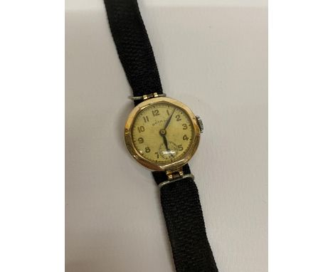 A VINTAGE 9CT YELLOW GOLD CASED ROTARY WATCH 