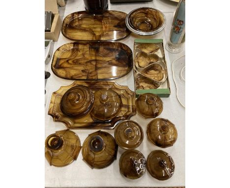 A LARGE QUANTITY OF AMBER CLOUD GLASSWARE TO INCLUDE CANDLESTICKS, PLATES, TRINKET BOWLS, ETC 