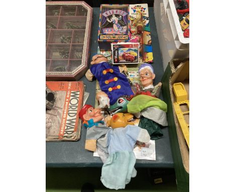 A QUANTITY OF VARIOUS TOYS TO INCLUDE PUNCH AND JUDY PUPPETS, TOY CAR ETC 