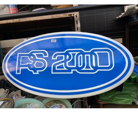 A LARGE OVAL RS2000 ILLUMINATED LIGHT BOX SIGN - WORKING ORDER AT TIME OF CATALOGUING.  WIDTH 86CM, HEIGHT 50CM, DEPTH 15CM 