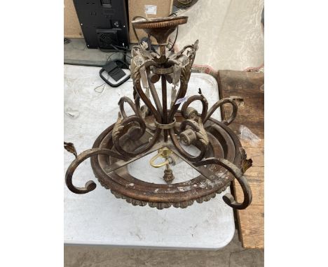 A DECORATIVE BRASS CEILING LIGHT FITTING 