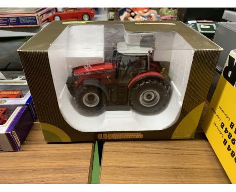 A UNIVERSAL HOBBIES MODEL MASSEY FERGUSON TRACTOR  8690  ITEM NO 2729 1:32 SCALE 