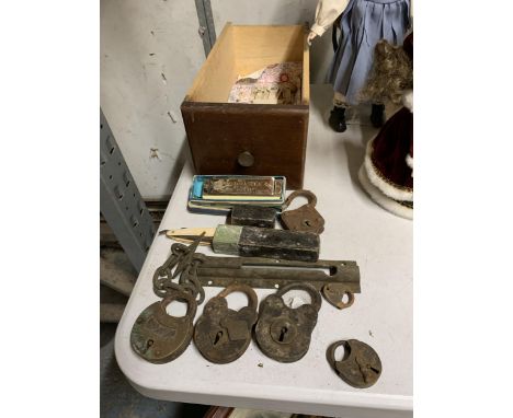 A VINTAGE DRAWER CONTAINING A QUANTITY OF HARDWARE ITEMS TO INCLUDE MAINLY VINTAGE LOCKS AND PADLOCKS PLUS A HARMONICA 