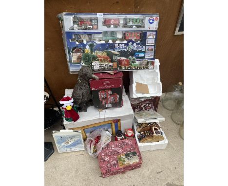 A LARGE ASSORTMENT OF CHRISTMAS DECORATIONS TO INCLUDE A LIGHT UP TRAIN, A HOLIDAY EXPRESS TRAIN SET, SNOW GLOBE AND FURTHER 