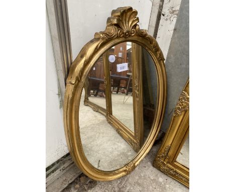 A MODERN OVAL GILT FRAMED WALL MIRROR, 24X16" 