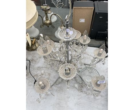 A GLASS NINE BRANCH CEILING LIGHT FITTING 