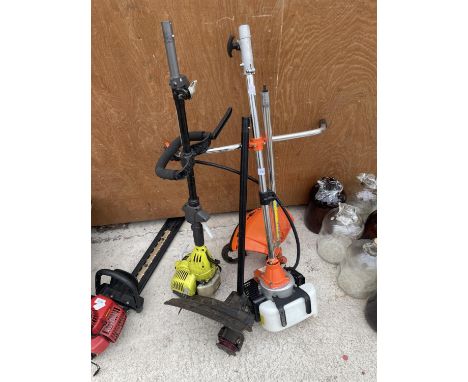 A RYOBI PETROL ENGINE GRASS STRIMMER AND A PARKER PETROL ENGINE GRASS STRIMMER 
