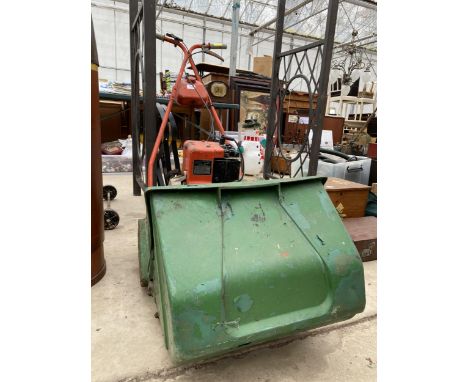 A VINTAGE PETROL ENGINE SUFFOLK LAWN MOWER WITH GRASS BOX 