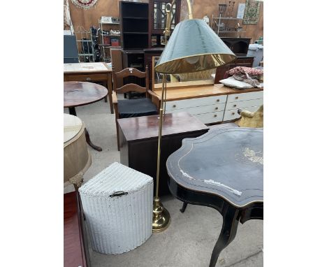 A MODERN BRASS READING LAMP AND LLOYD LOOM LINEN BASKET 