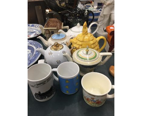 A QUANTITY OF TEAPOTS TO INCLUDE BURLEIGHWARE, SADLER, POOLE, ETC PLUS MUGS 