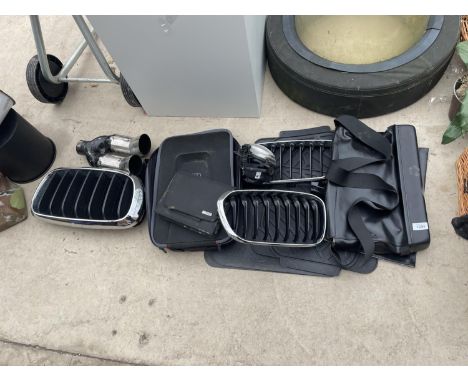 AN ASSORTMENT OF AUTOMOBILE ITEMS TO INCLUDE AN AUDI BAG, CAR MATS, GRILLS AND A LIGHT ETC 
