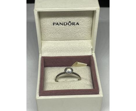 A PANDORA SILVER RING IN A PRESENTATION BOX 