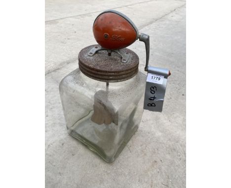 A VINTAGE GLASS MANUAL BUTTER CHURN 