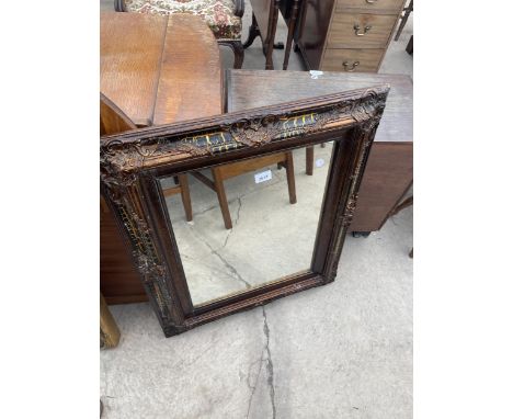 A GILT FRAMED WALL MIRROR, 28" X 24" 