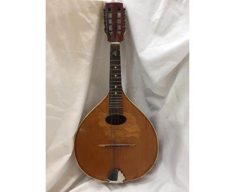 A VINTAGE INLAID MANDOLIN WITH A PLECTRUM 