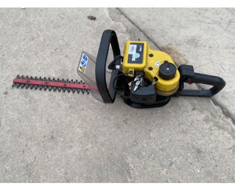 A PETROL ENGINE HEDGE TRIMMER 