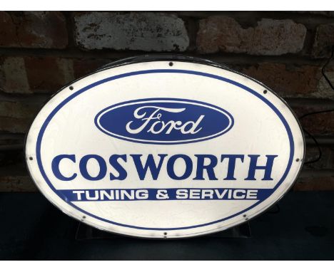 A FORD COSWORTH ILLUMINATED LIGHT BOX SIGN - WORKING ORDER AT TIME OF CATALOGUING.  WIDTH 43CM, HEIGHT 31CM, DEPTH 10CM 