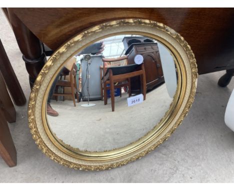 A ATSONIA GILT FRAMED CONVEX WALL MIRROR, 16" DIA 