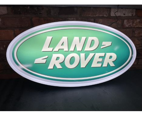 A LAND ROVER ILLUMINATED LIGHT BOX SIGN - WORKING ORDER AT TIME OF CATALOGUING.  WIDTH 94CM, HEIGHT 48CM, DEPTH 8CM 