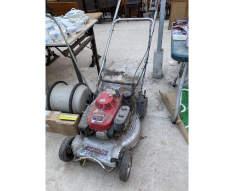 A LAWNFLITE PRO PETROL LAWNMIOWER WITH HONDA ENGINE 