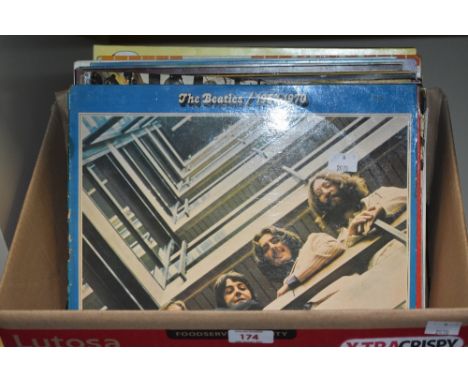 A box of 12' vinyl albums, to include The Beatles/1967-70, The Beatles/1962-66, A Tapestry of Early Christmas Carols and Fest