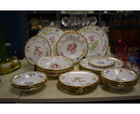 A Royal Worcester Fine Bone China part dinner service, having gilt edging and hand coloured foliage on a ice white ground, to
