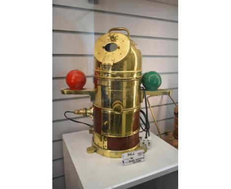 An early 20th century wooden and brass submarine binnacle compass, having to the front a plaque stating, Faithful Freddy No20