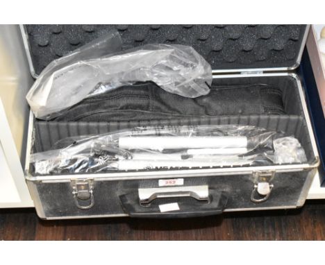 A modern table top Meade spotting scope with tripod and original box.