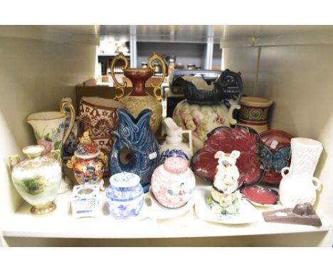 A comical vintage Staffordshire style pottery pig sitting on a hen basket playing the trumpet, h15.5cm, sold together with a 