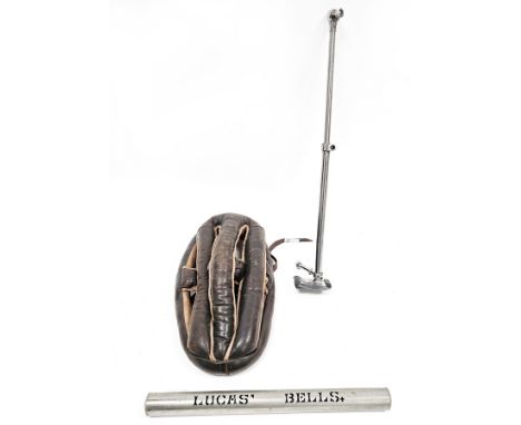 Three items of cycling interest including an early 20th century leather racing cyclist's helmet with chin strap, advertising 