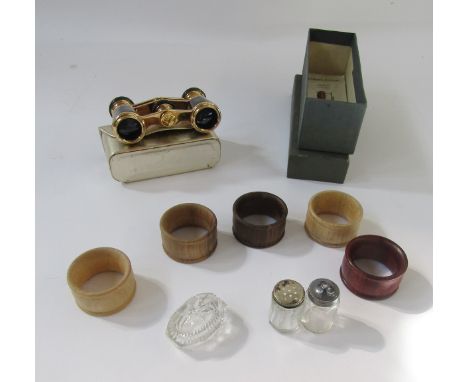 Pair of mother-of-pearl and gilt metal Trianon XXX opera glasses&nbsp;in gold case, set of five Empire Woods napkin rings&nbs