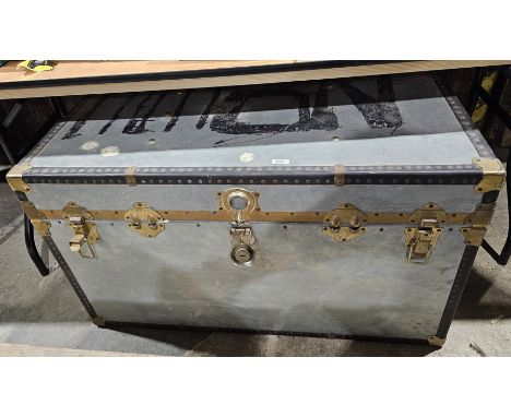 Large vintage brass mounted steamer travelling trunk, studded and painted in grey-blue, enclosing assorted military uniform a