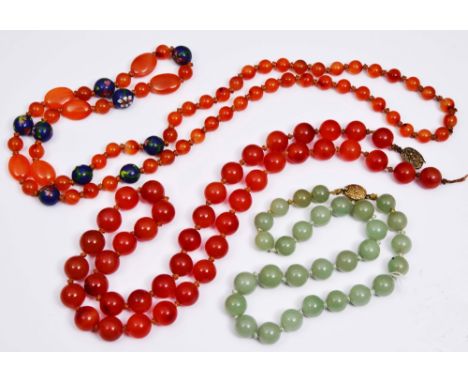 A CHINESE JADE BEAD NECKLACE with metal clasp stamped silver and two hardstone bead necklaces with metal clasp stamped silver