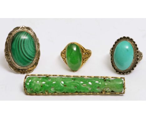 A CHINESE GILT BAR BROOCH with carved jade setting, a Chinese 14k gold ring with oval jade setting, a Chinese ring with oval 