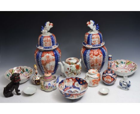 A COLLECTION OF JAPANESE AND CHINESE PIECES including a pair of Imari vases, a Chinese enamel teapot and a few other pieces