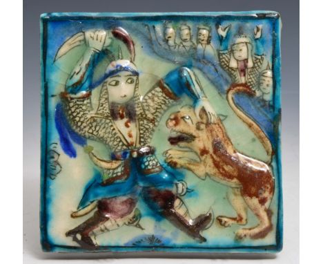 A QAJAR TURQUOISE TILE, a warrior fighting a lion, circa 1900, 14.5cm square