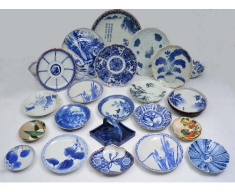 A COLLECTION OF NINETEEN JAPANESE ARITA AND OTHER JAPANESE CERAMIC DISHES and bowls, some marked, mainly 19th Century (23)