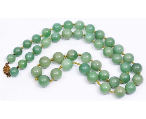 A CHINESE JADE NECKLACE with gilt metal filigree clasp, approximately 70cm long