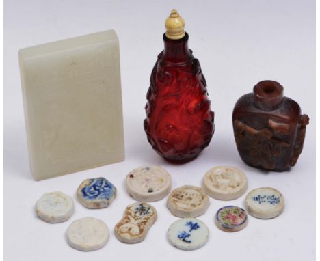 A CHINESE JADE PENDANT of various scholars to one side and inscription to the reverse, a few Chinese snuff bottles and variou