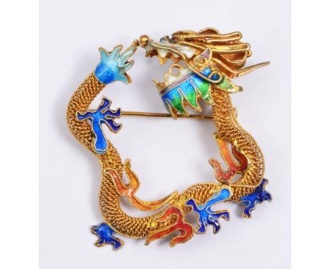 A CHINESE GILT BROOCH in the form of a stylised dragon with polychrome enamel decoration