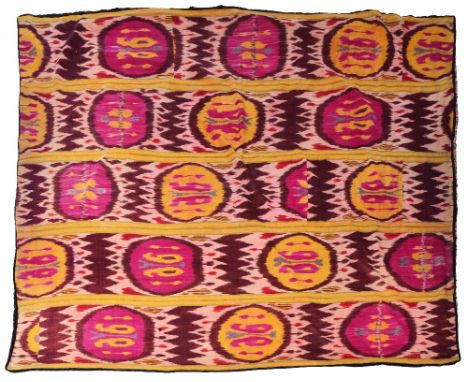 A LARGE INDIAN SILK IKAT BED COVER, pattern in yellow, purple, blue and green, floral silk print panel underside