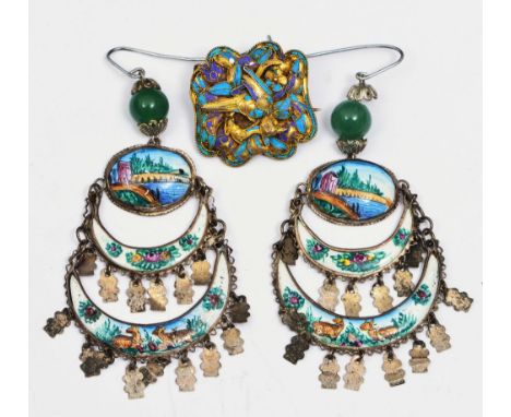 A PAIR OF TURKISH SILVER EARRINGS with painted enamel decoration of a river scene, flowers and animals, three tiers and green
