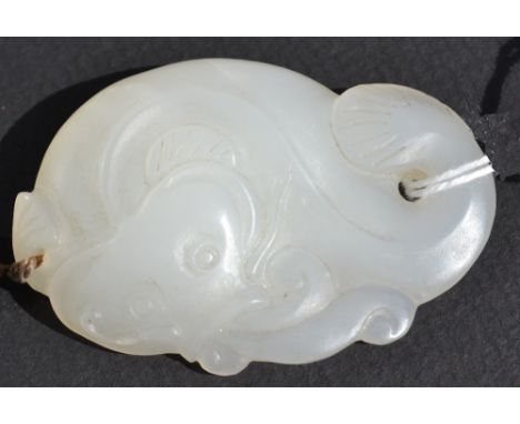 A CHINESE WHITE JADE PENDANT depicting a fish in water, 18th/19th Century, 5.6cm long