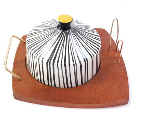 A Winecraft retro butter dish, with ceramic zebra finish top with yellow knop, on a shaped wooden base with carry handle and 