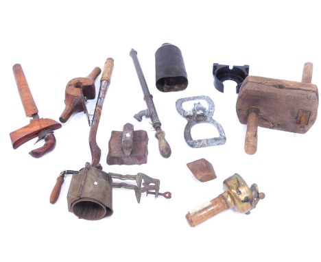 A collection of tools, to include a spindle plain, a clamp, brass compass, a garden sprayer and a Eastern Kris, with shaped b