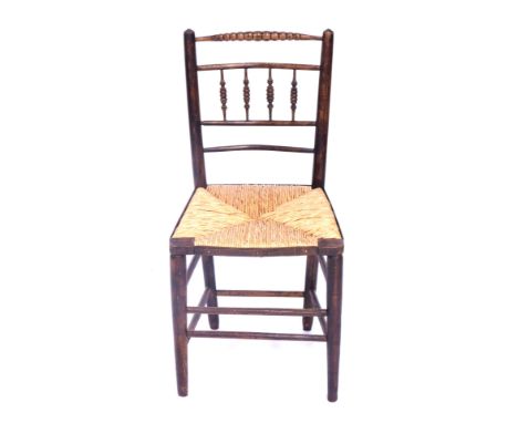 A 19thC ash rush seated chair, with bobbin supports, 88cm high.