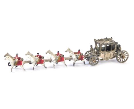 A Coronation Coach, the coach in pewter, with enamel painted horse pulley, 12cm diameter.