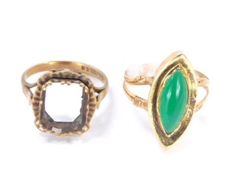 Two dress rings, comprising a 9ct gold dress ring frame, 4.2g, and an imitation jade set dress ring on a yellow metal band un